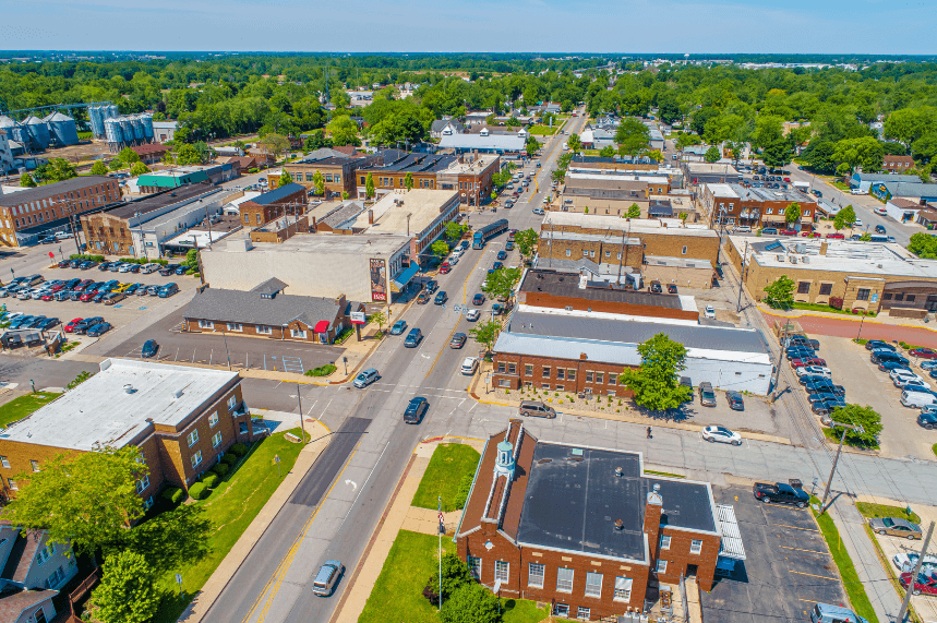 Aerial view of retail parking lot with numbered spaces